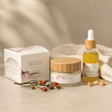 Revive Skincare products including a jar, bottle, and box labeled 'Daily Revive' on a neutral background.